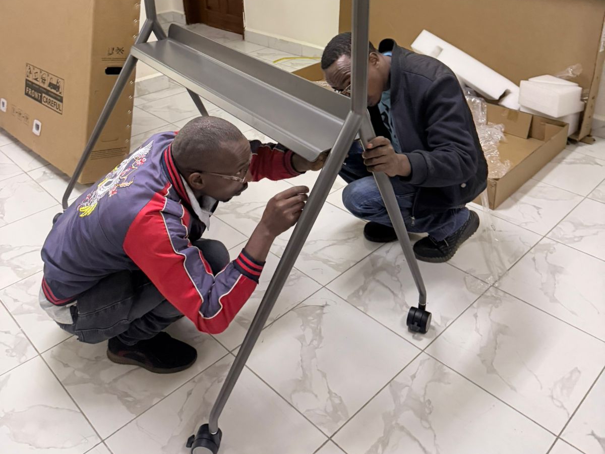 Technician assembling IFPD Stand