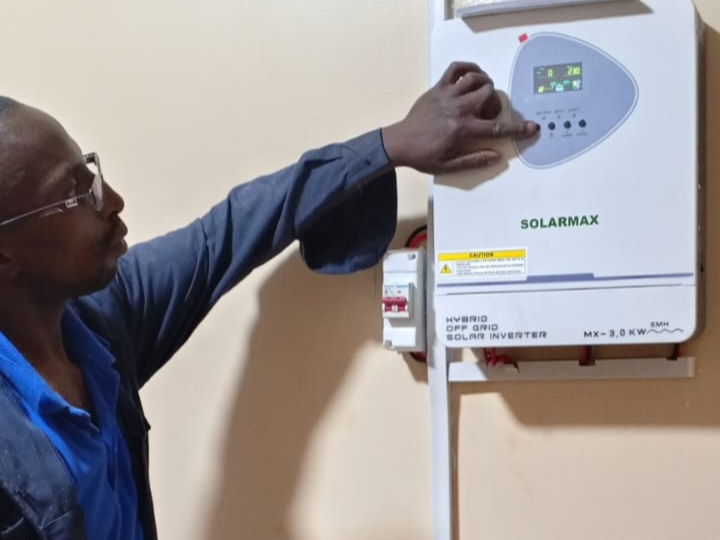 Technician configuring a solar controller