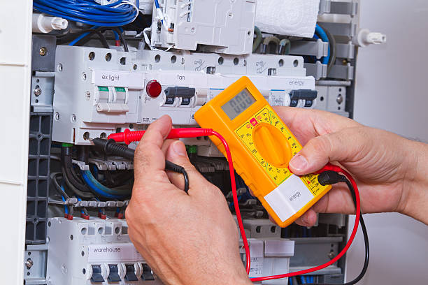 A photo of an electrician conducting a safe test